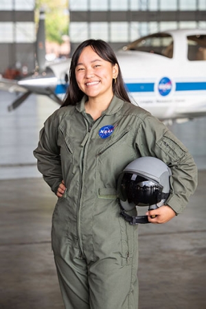 Lum trying on an official NASA flight suit.