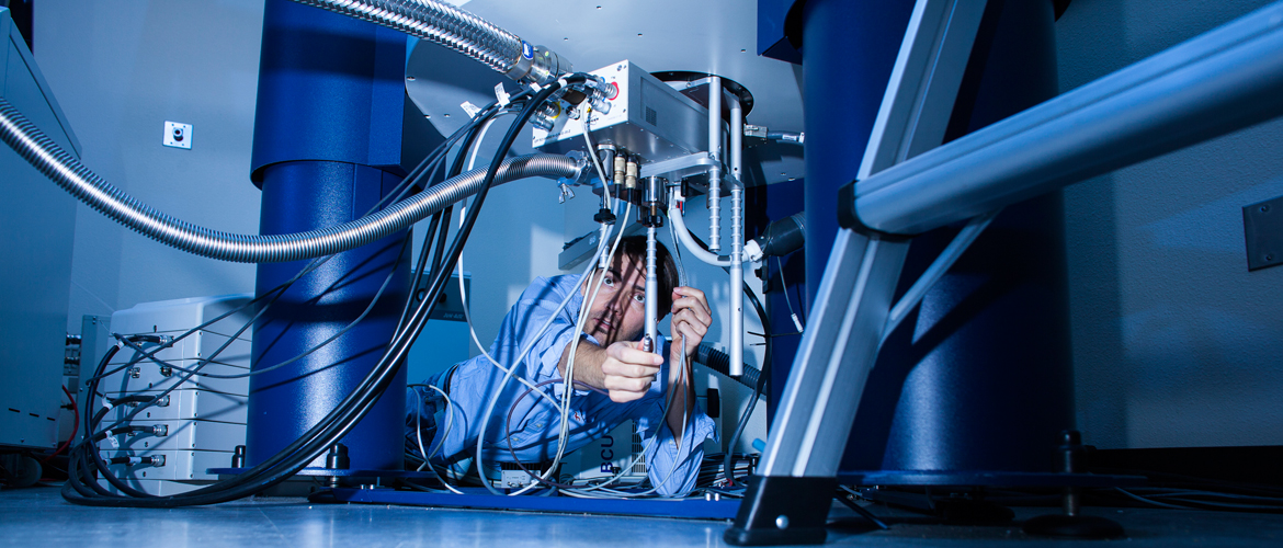 Our biological sciences researchers study the integration of systems to better understand the overall function of biological systems as a whole. Picture of Fabian Filipp conducting research experiment 