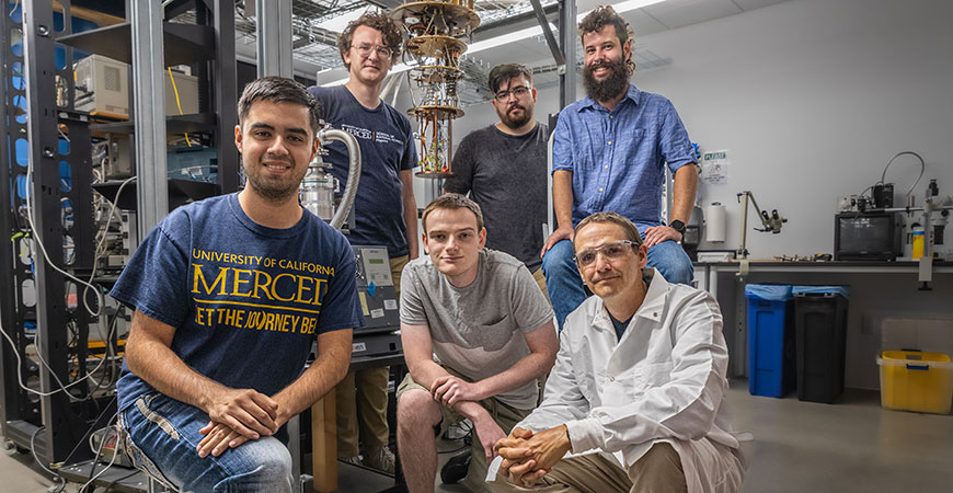 Professor Jay Sharping, lower right, and the students in his lab will have enhanced research capabilities with refurbished dilution refrigerators. 