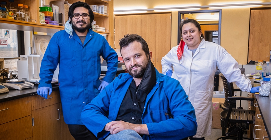 Professor Shahar Sukenik, center, and his graduate students Eduardo Flores and Karina Guadalupe